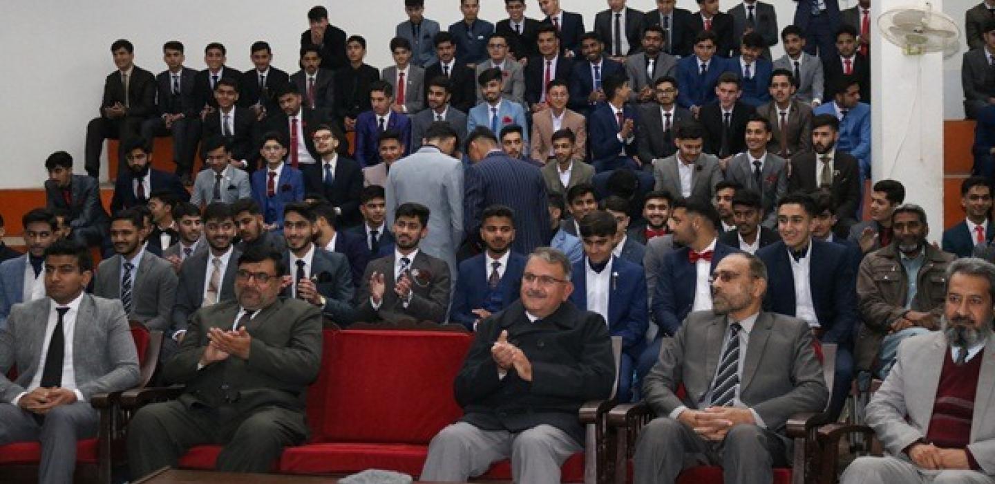 Movie theatre scene with college principal 