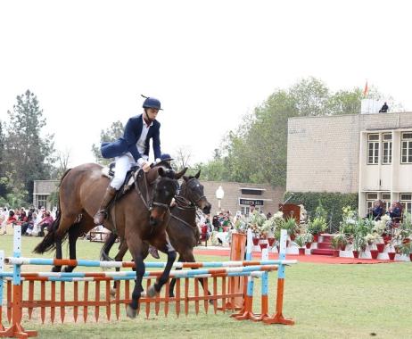 Horse rider cadet is jumping